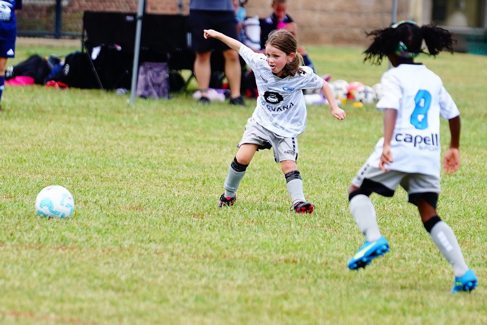 Young players competing in a match at a JFC tournament